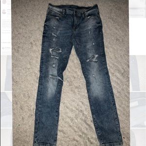 Dark wash destroyed jeans